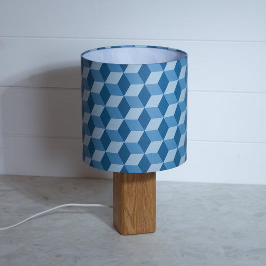 Blue Cubes Geometric Print Lampshade on a Hardwood Table Lamp