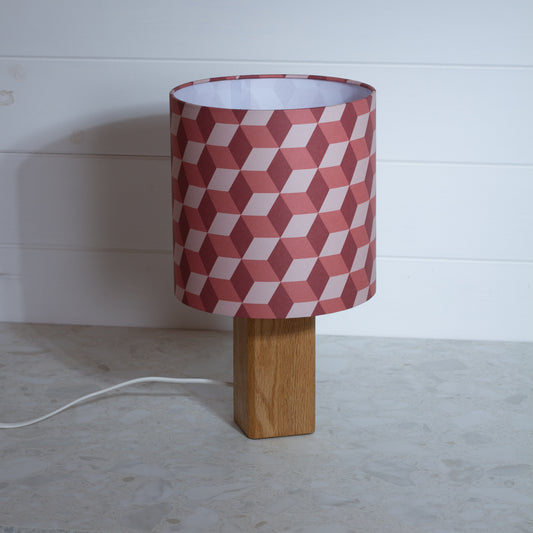 Red Cubes Geometric Print Lampshade on a Hardwood Table Lamp