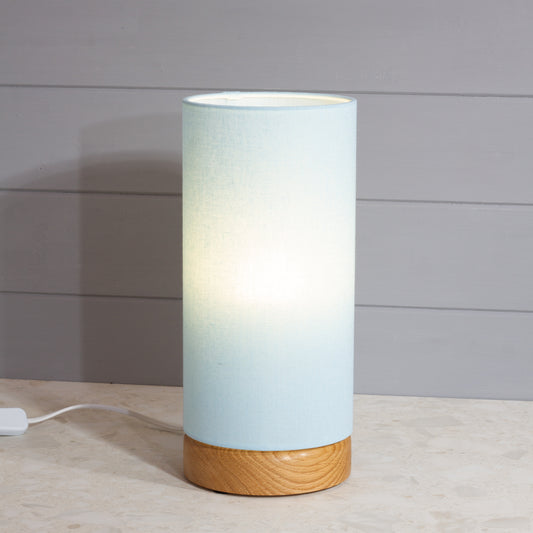 Round Oak Table Lamp (15cm) with 15cm x 30cm Drum Lampshade in F190 ~ Baby Blue Linen
