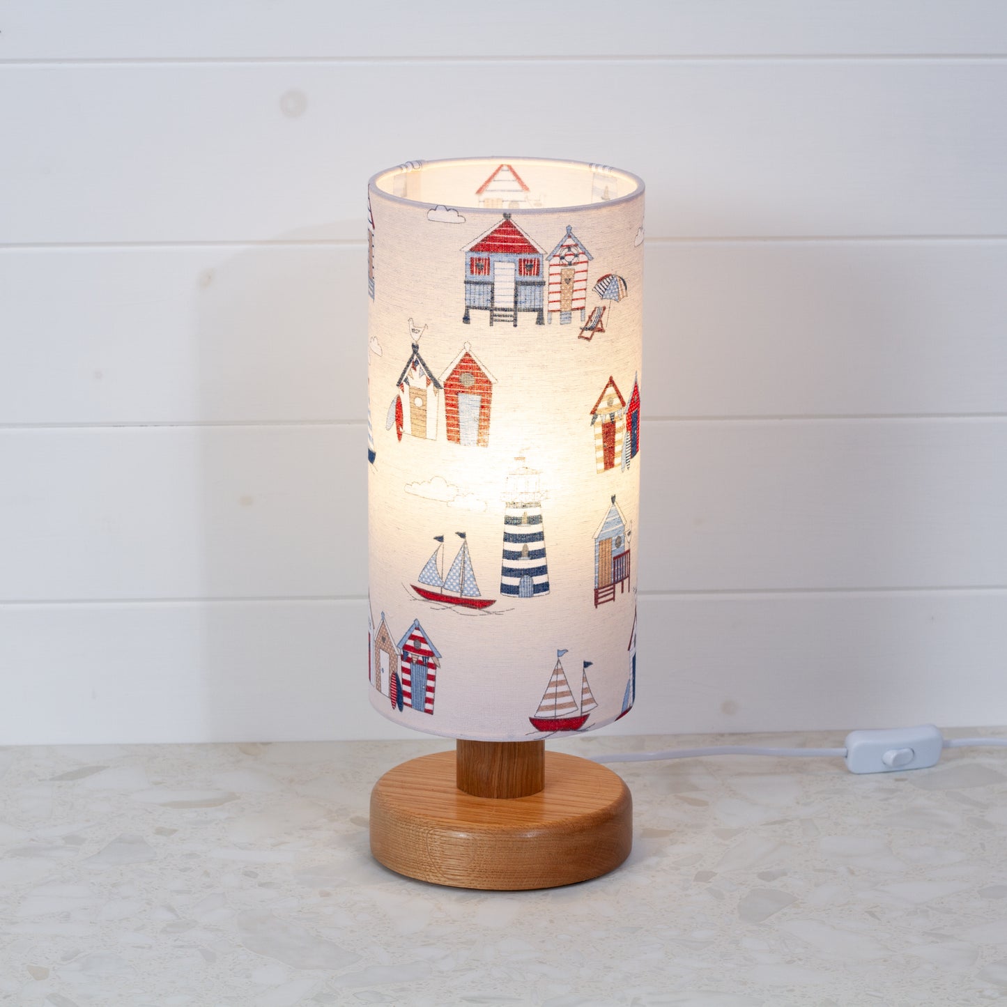 Round Oak Table Lamp (15cm) with 15cm x 30cm Drum Lampshade in F130 Beach Huts Fabric