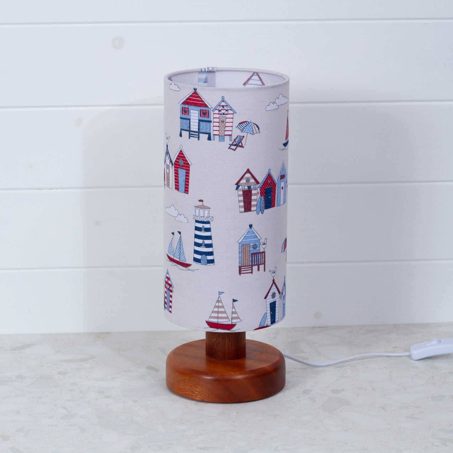 Round Sapele Table Lamp (15cm) with 15cm x 30cm Drum Lampshade in F130 Beach Huts Fabric