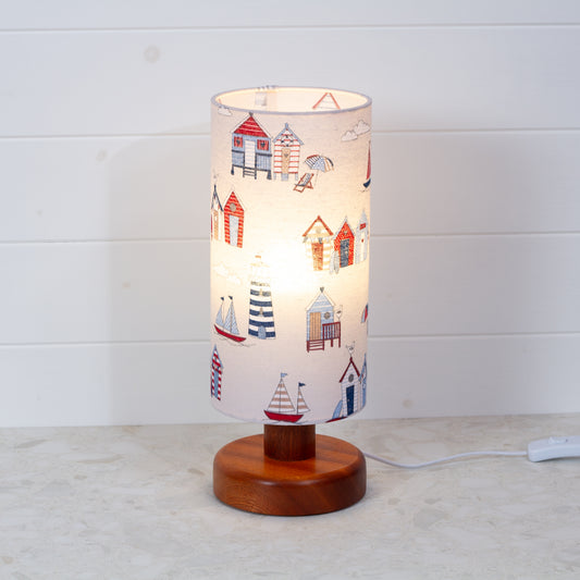 Round Sapele Table Lamp (15cm) with 15cm x 30cm Drum Lampshade in F130 Beach Huts Fabric