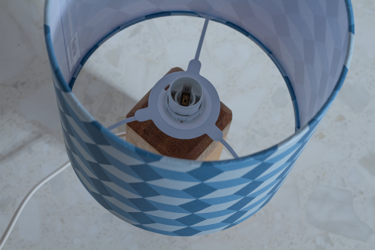 Blue Cubes Geometric Print Lampshade on a Hardwood Table Lamp
