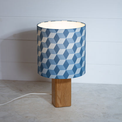 Blue Cubes Geometric Print Lampshade on a Hardwood Table Lamp