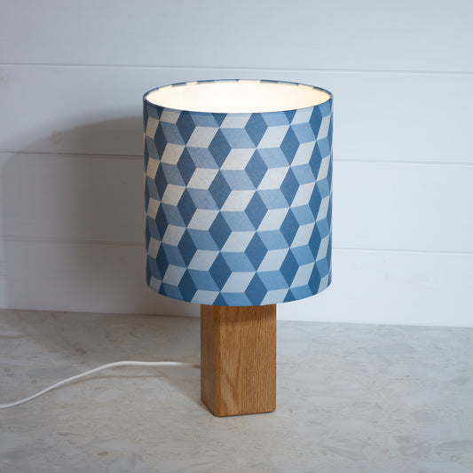 Blue Cubes Geometric Print Lampshade on a Hardwood Table Lamp