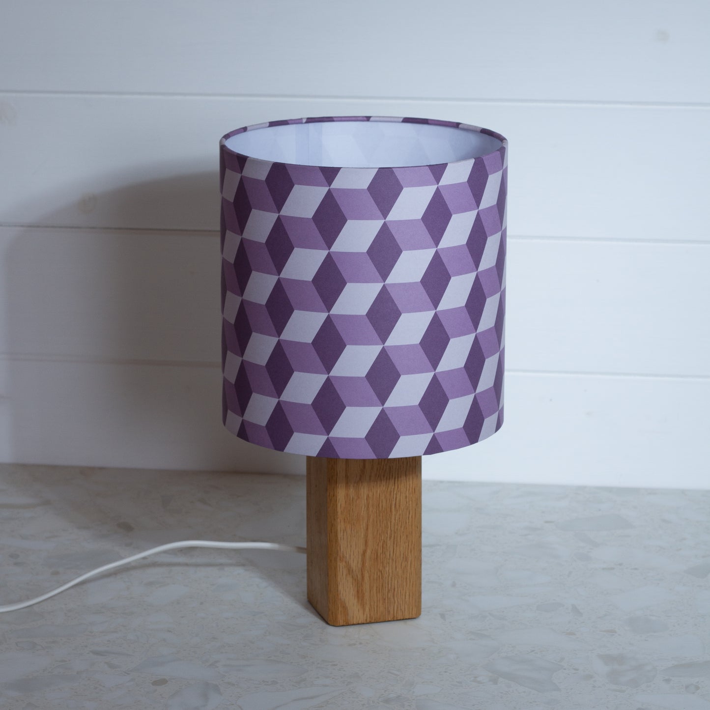 Purple Cubes Geometric Print Lampshade on a Hardwood Table Lamp