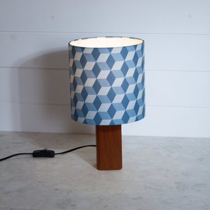 Blue Cubes Geometric Print Lampshade on a Hardwood Table Lamp