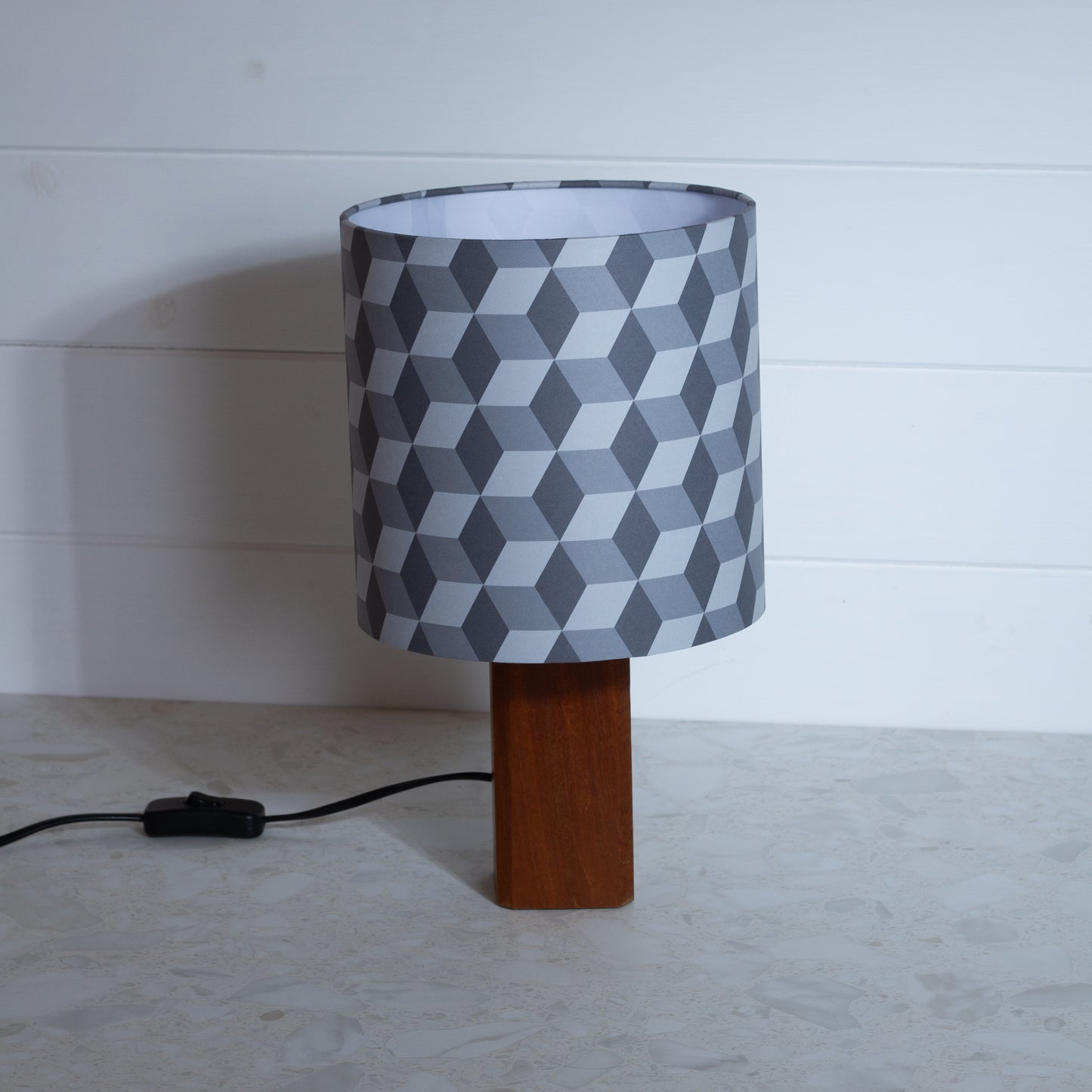 Grey Cubes Geometric Print Lampshade on a Hardwood Table Lamp