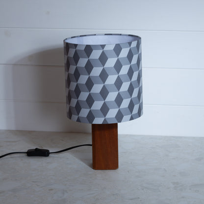 Grey Cubes Geometric Print Lampshade on a Hardwood Table Lamp