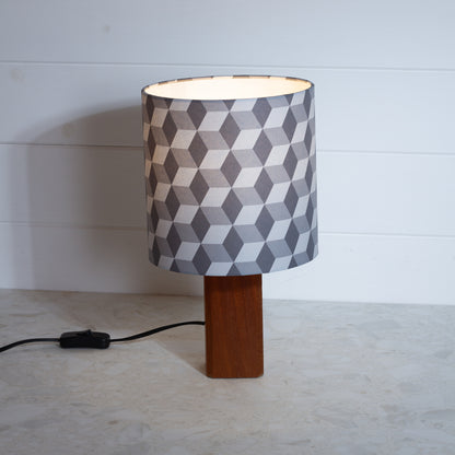 Grey Cubes Geometric Print Lampshade on a Hardwood Table Lamp