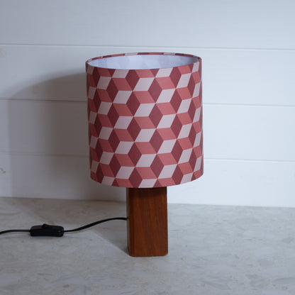 Red Cubes Geometric Print Lampshade on a Hardwood Table Lamp