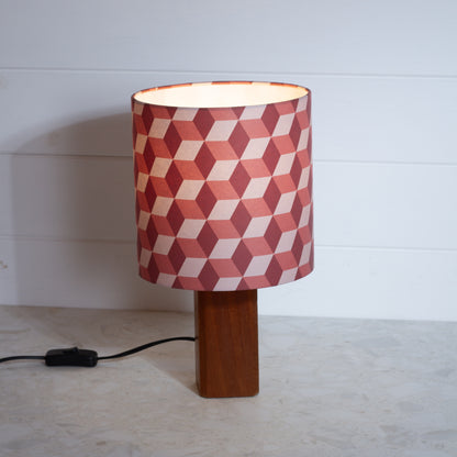 Red Cubes Geometric Print Lampshade on a Hardwood Table Lamp