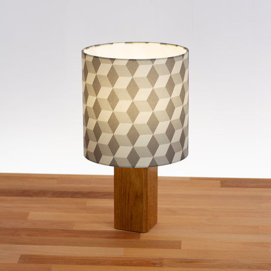 Cubes Geometric Print Lampshade on a Hardwood Table Lamp