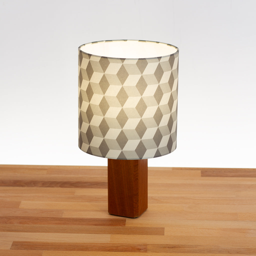 Cubes Geometric Print Lampshade on a Hardwood Table Lamp