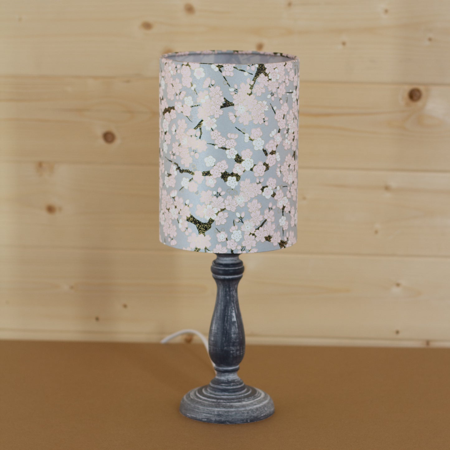 Paros Wooden Table Lamp with a Drum Shade (15cm X 20cm) in W02 ~ Pink Cherry Blossom on Grey
