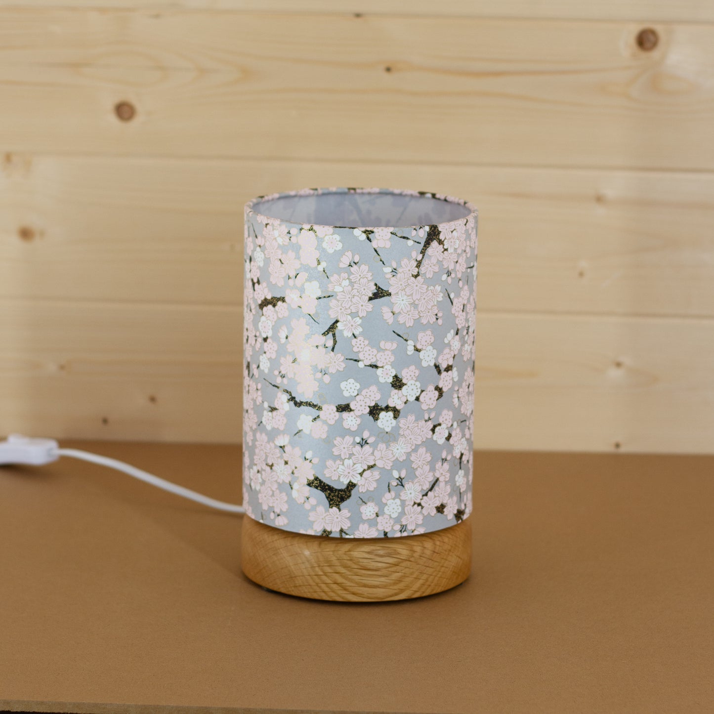 Flat Round Oak Table Lamp with 15cm x 20cm Lampshade in W02 ~ Pink Cherry Blossom on Grey