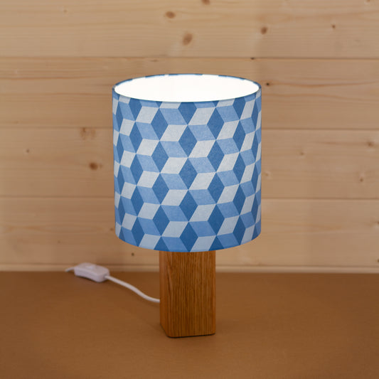 Blue Cubes Geometric Print Lampshade on a Hardwood Table Lamp
