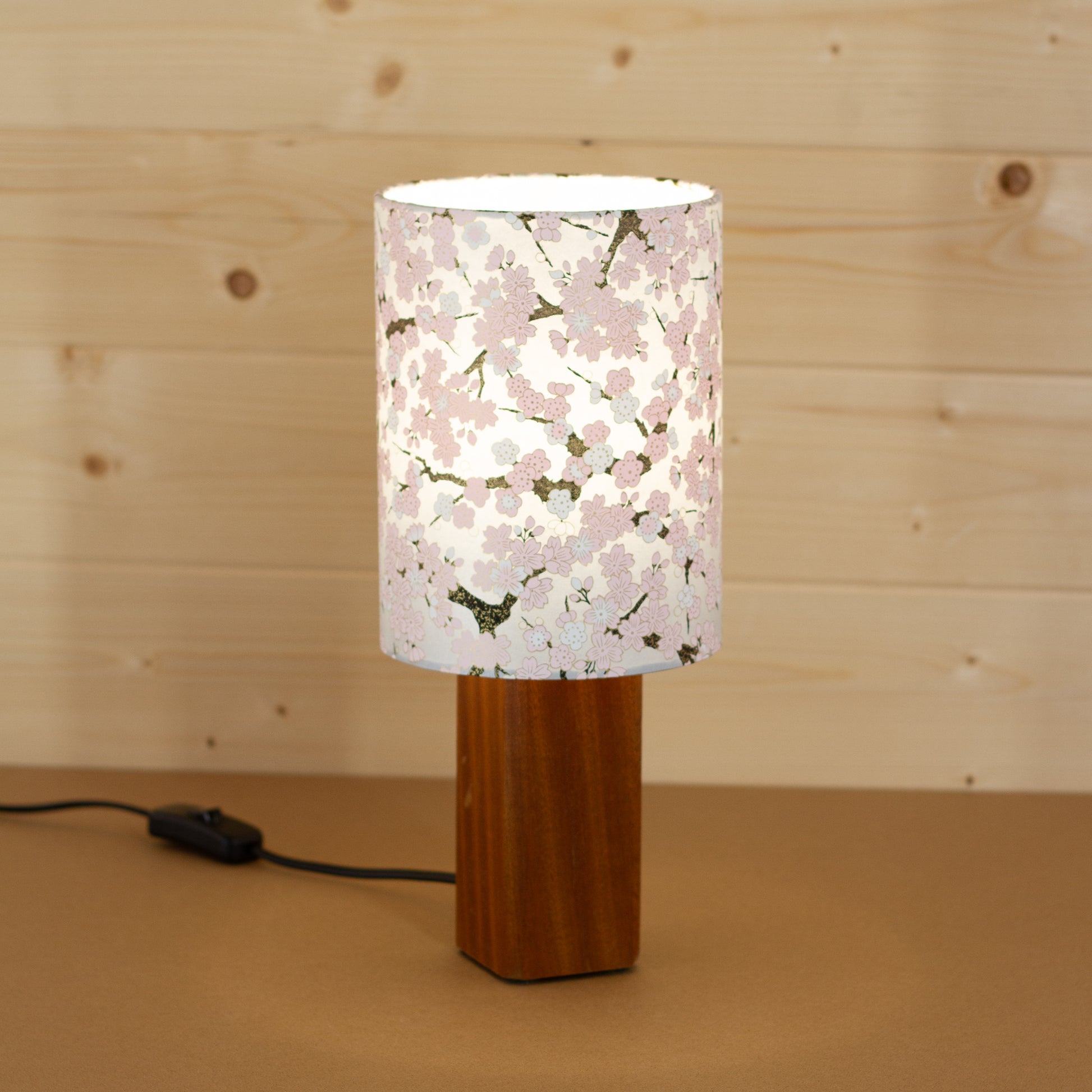 Lit Cherry Blossom Lampshade on Square Sapele Table Lamp base, Handmade by Imbue Lighting on the Isle of Anglesey
